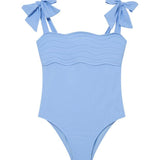 Everlee Baby Blue Kids Swimsuit with Bow Strap Detail | Moeva | Kids Swimsuits | Each week unveils new pieces—luxury swimwear, fluid resort silhouettes, and elevated summer-to-evening essentials designed to carry you from coastal escapes to city nights.