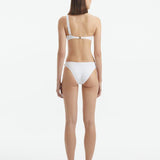 Eyre White Mid Coverage Textured Bikini Bottom | Moeva | Bikini Bottom | Each week unveils new pieces—luxury swimwear, fluid resort silhouettes, and elevated summer-to-evening essentials designed to carry you from coastal escapes to city nights.