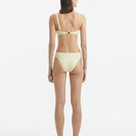 Eyre Yellow Mid Coverage Textured Bikini Bottom | Moeva | Bikini Bottom | Each week unveils new pieces—luxury swimwear, fluid resort silhouettes, and elevated summer-to-evening essentials designed to carry you from coastal escapes to city nights.