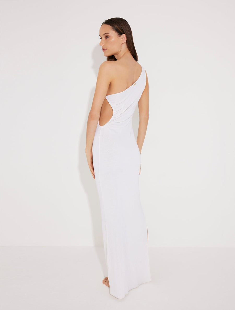 Back View: Model in Fewa White Dress - MOEVA Luxury Swimwear, Knitted, Ankle Length, Ruched Cutout, Close Fit, MOEVA Luxury Swimwear
