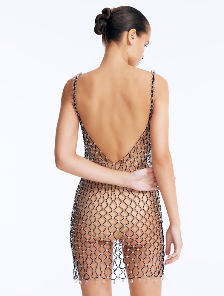 Back View: Flora Black Swimsuit on Model - Low Back, Clear Glass Beaded Mini Macrame Dress, Fully Lined, MOEVA Luxury Swimwear