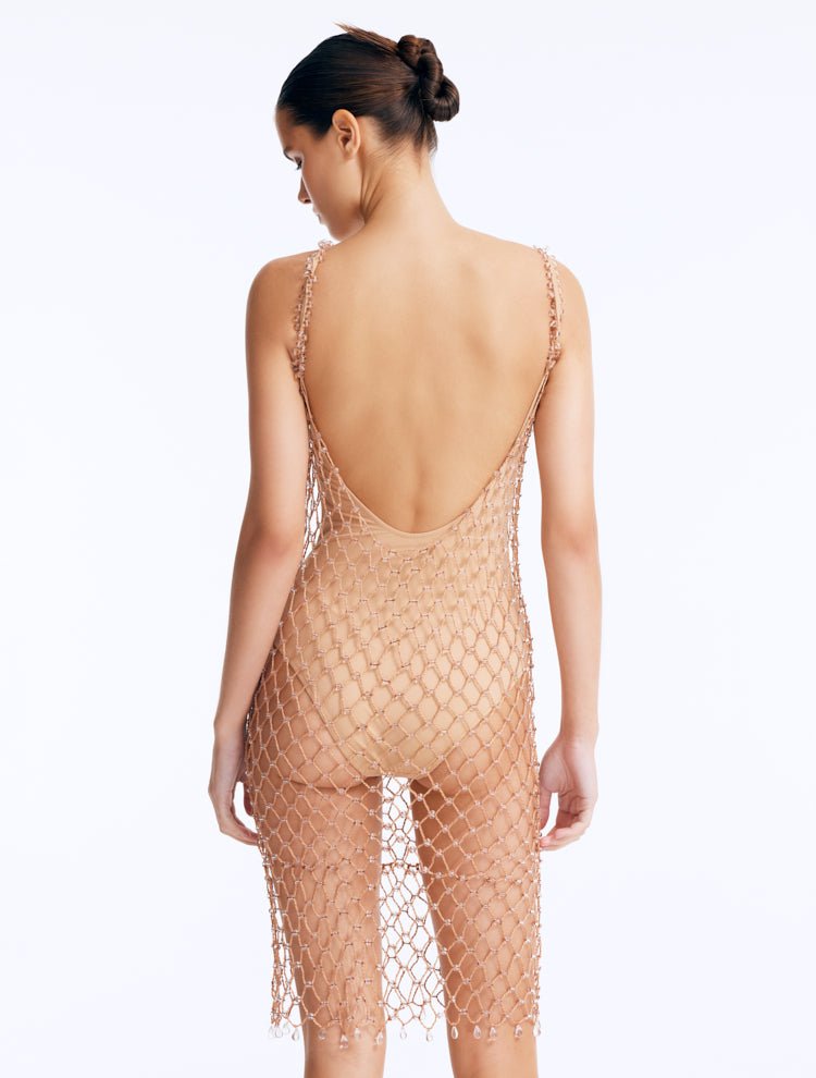 Back View: Flora Bronze Swimsuit on Model - Low Back, Clear Glass Beaded Mini Macrame Dress, Nude Swimsuit Inside, Fully Lined, MOEVA Luxury Swimwear