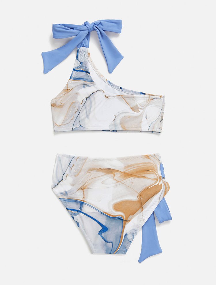 Back View: Giulia Blue Abstract Kids Bikini - MOEVA Luxury Swimwear, One Shoulder, Fully Lined, Mommy and Me, Soft Touch Fabric, Contrast Colors, Self-Tie Straps, MOEVA Luxury Swimwear