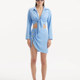 Greta Baby Blue Long Sleeve Tie Front Shirt | Moeva | Beachwear Tops | Each week unveils new pieces—luxury swimwear, fluid resort silhouettes, and elevated summer-to-evening essentials designed to carry you from coastal escapes to city nights.