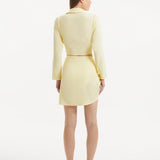Greta Yellow Long Sleeve Tie Front Shirt | Moeva | Beachwear Tops | Each week unveils new pieces—luxury swimwear, fluid resort silhouettes, and elevated summer-to-evening essentials designed to carry you from coastal escapes to city nights.