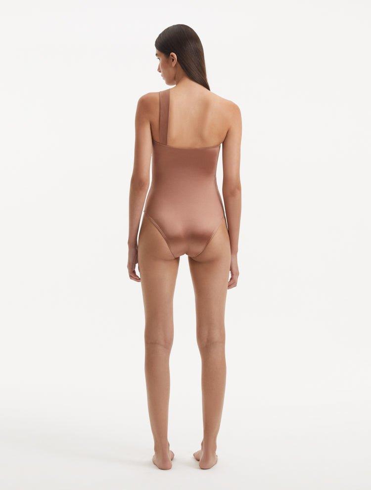 Halin Brown One Shoulder Satin Swimsuit | Moeva | Swimsuit | Each week unveils new pieces—luxury swimwear, fluid resort silhouettes, and elevated summer-to-evening essentials designed to carry you from coastal escapes to city nights.