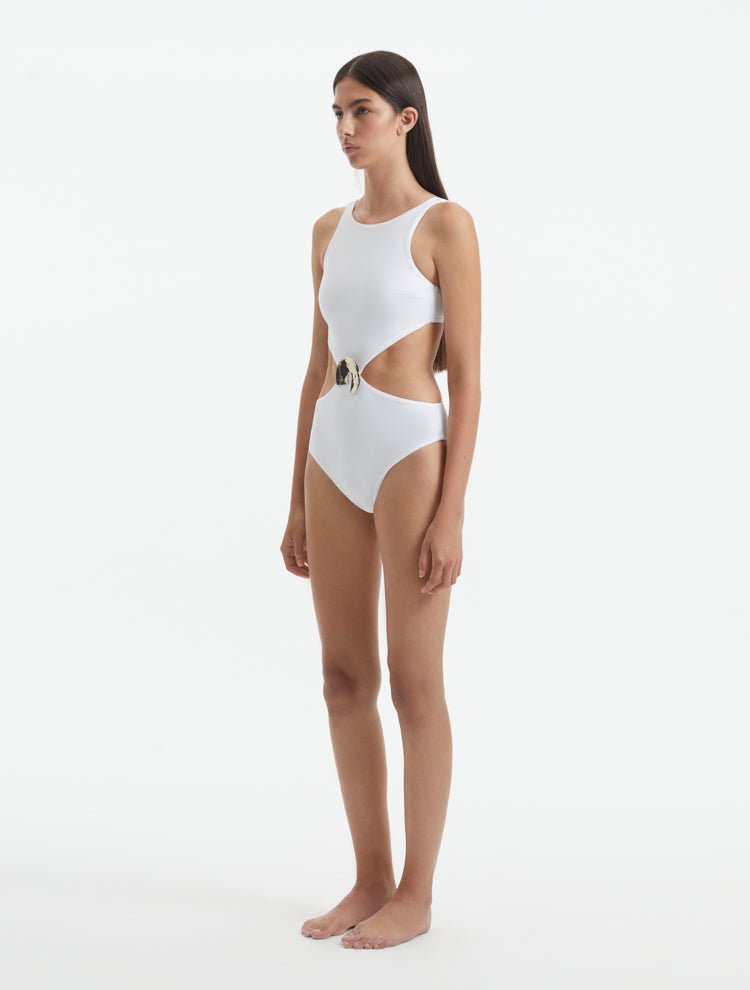Side View: Model in Honora White Swimsuit- MOEVA Luxury Swimwear, Removable Padding, Italian Fabric, Special Lycra Xtralife Certificate, MOEVA Luxury Swimwear 