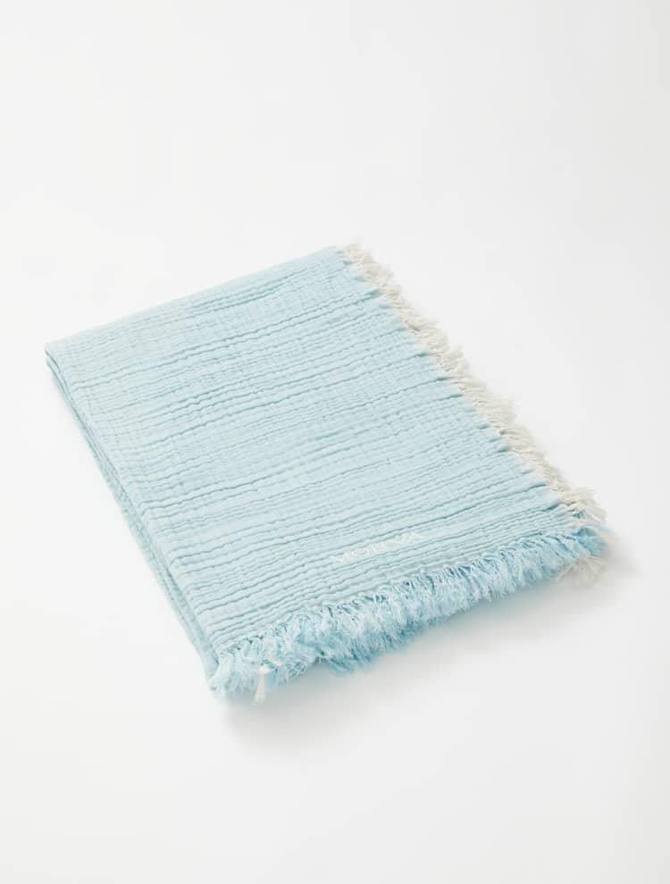 Ibiza Blue/Ecru Towel | Moeva | Towel | Each week unveils new pieces—luxury swimwear, fluid resort silhouettes, and elevated summer-to-evening essentials designed to carry you from coastal escapes to city nights.