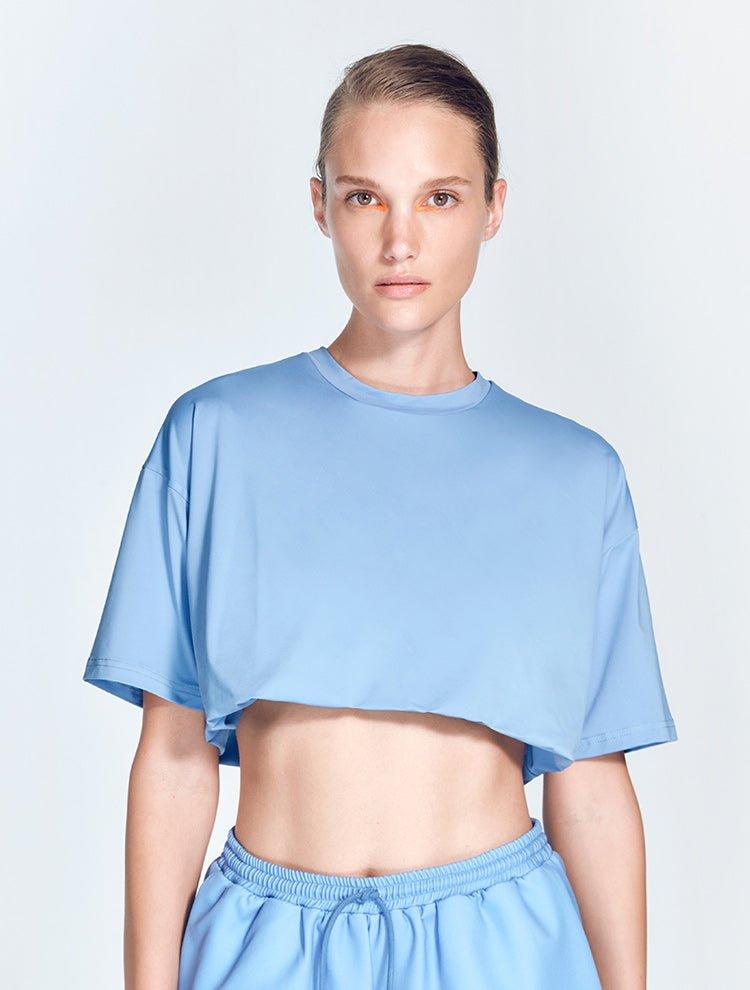 Isolde Blue Top | Moeva | Activewear | Each week unveils new pieces—luxury swimwear, fluid resort silhouettes, and elevated summer-to-evening essentials designed to carry you from coastal escapes to city nights.