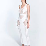 Izzy White Sleeveless Knitted Maxi Dress | Moeva | Beachwear Dresses | Each week unveils new pieces—luxury swimwear, fluid resort silhouettes, and elevated summer-to-evening essentials designed to carry you from coastal escapes to city nights.