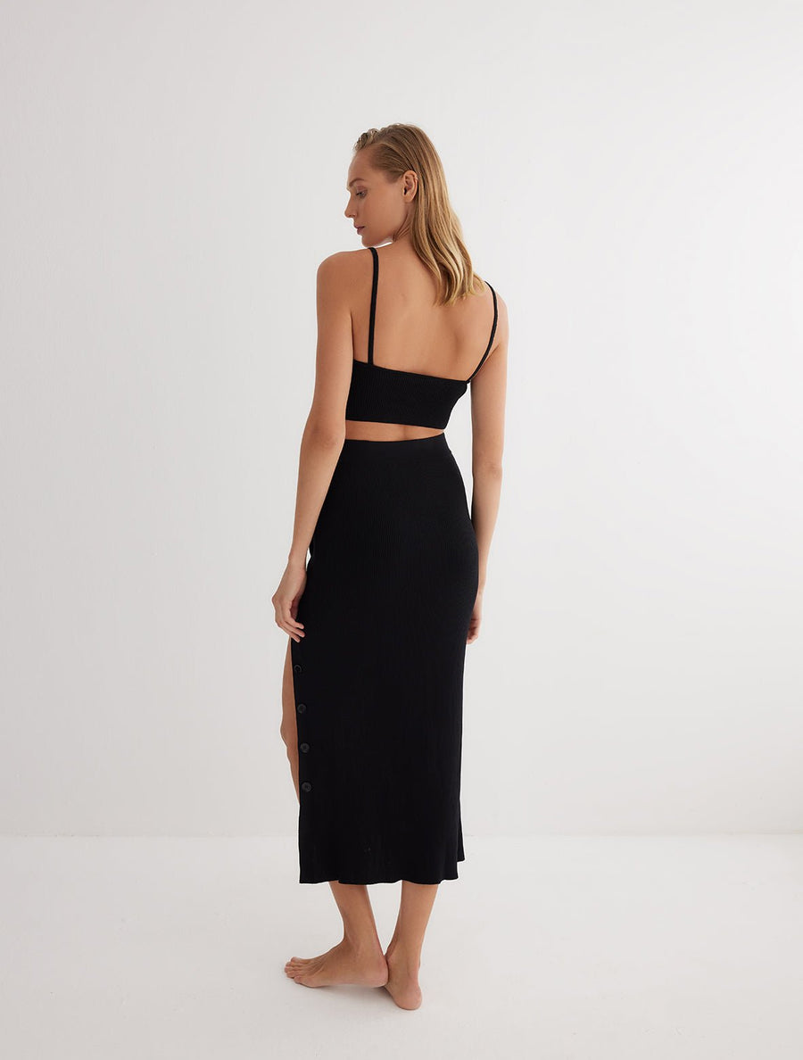Back View: Model in Jules Black Skirt - MOEVA Luxury Swimwear, Ready to Wear, Unlined, Comfort, Knitted, Maxi Skirt, MOEVA Luxury Swimwear