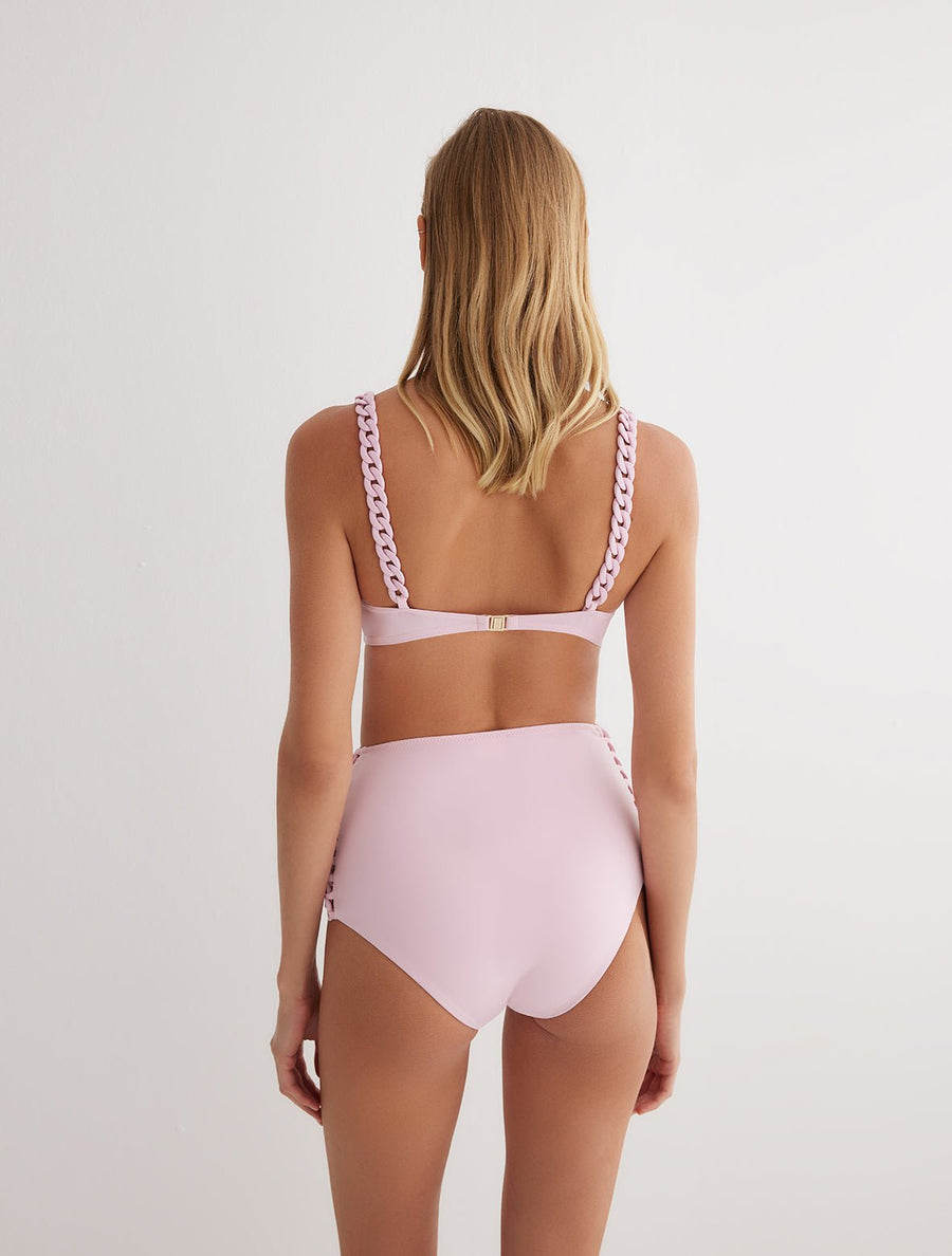 Back View: Model in Kerstin Pink Bikini Bottom - MOEVA Luxury Swimwear, French & Italian Fabric, Special Lycra Xtralife Certificate, Fully Lined, Accessorised, Soft Touch Fabric, MOEVA Luxury Swimwear