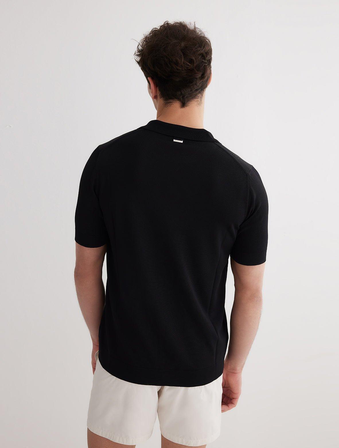 Lars Black Polo Shirt with Button Fastening | Moeva | Men Classic Collar Shirts | Each week unveils new pieces—luxury swimwear, fluid resort silhouettes, and elevated summer-to-evening essentials designed to carry you from coastal escapes to city nights.