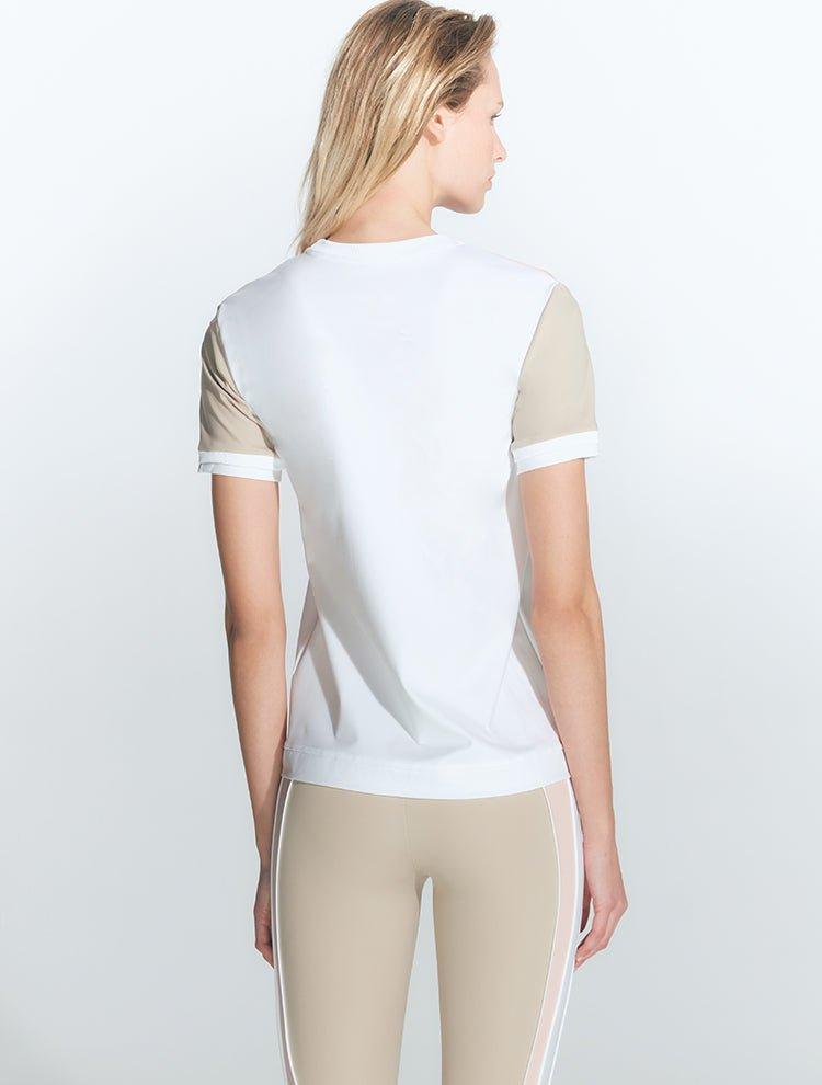 Leticia White Top | Moeva | Activewear | Each week unveils new pieces—luxury swimwear, fluid resort silhouettes, and elevated summer-to-evening essentials designed to carry you from coastal escapes to city nights.