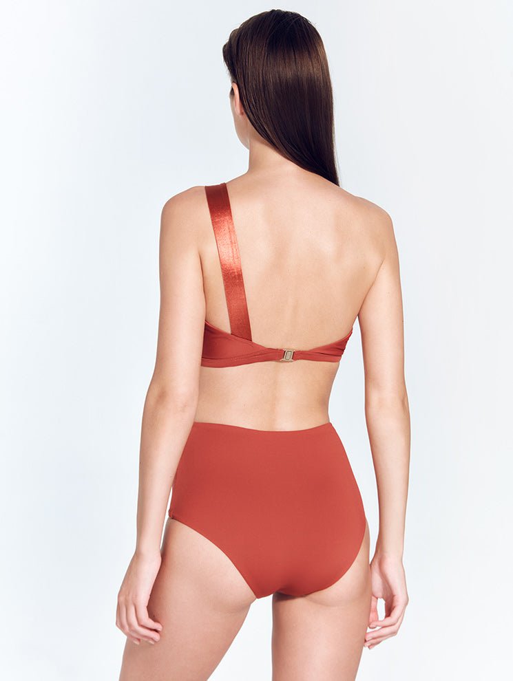 Back View: Model in London Red Ochre Bikini Top - MOEVA Luxury Swimwear, Gold Clasps at the Back, Lycra XtraLife® Certificate, Italian Fabric, MOEVA Luxury Swimwear