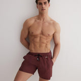 Louis Bordeaux Quick-Dry Swim Shorts | Moeva | Men Ultralight Swim Shorts | Each week unveils new pieces—luxury swimwear, fluid resort silhouettes, and elevated summer-to-evening essentials designed to carry you from coastal escapes to city nights.