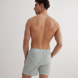 Louis Green Abstract Quick-Dry Swim Shorts | Moeva | Men Ultralight Swim Shorts | Each week unveils new pieces—luxury swimwear, fluid resort silhouettes, and elevated summer-to-evening essentials designed to carry you from coastal escapes to city nights.