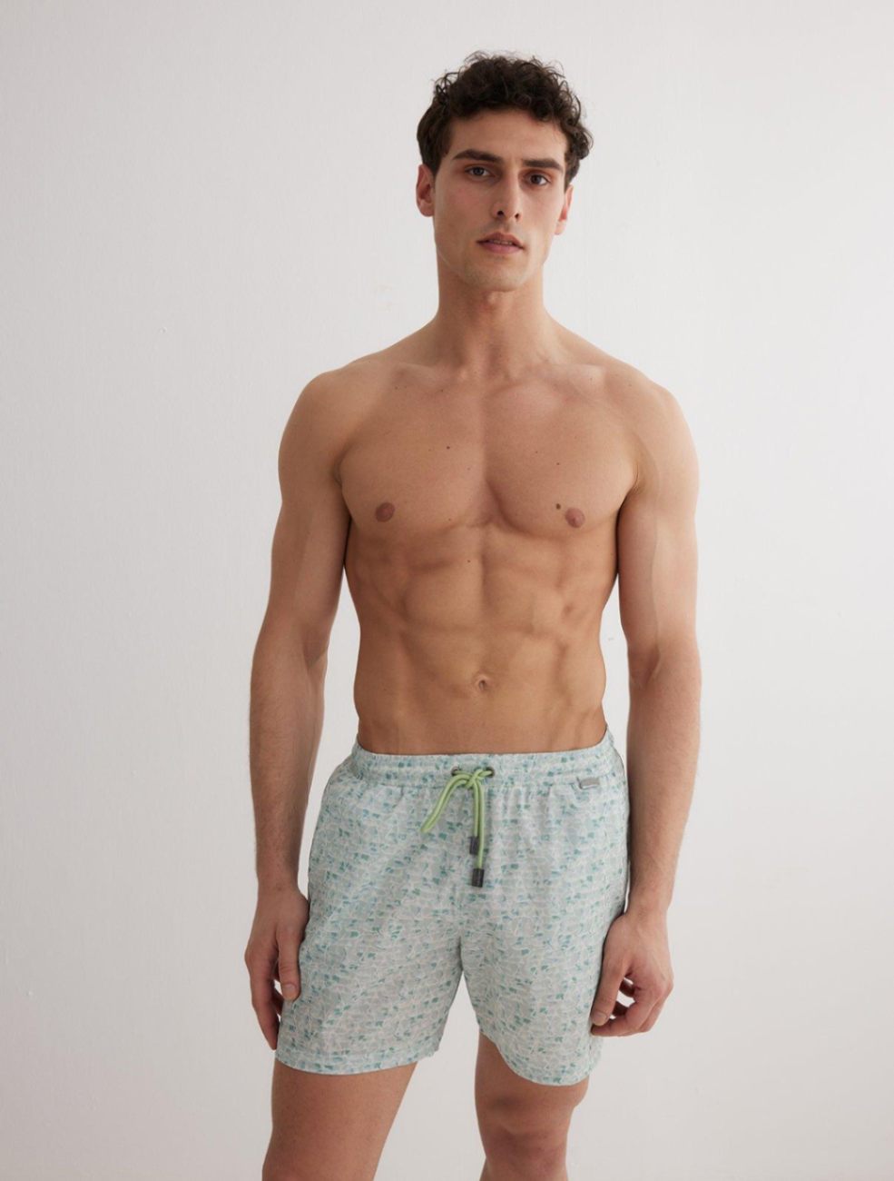 Louis Green Abstract Quick-Dry Swim Shorts | Moeva | Men Ultralight Swim Shorts | Each week unveils new pieces—luxury swimwear, fluid resort silhouettes, and elevated summer-to-evening essentials designed to carry you from coastal escapes to city nights.