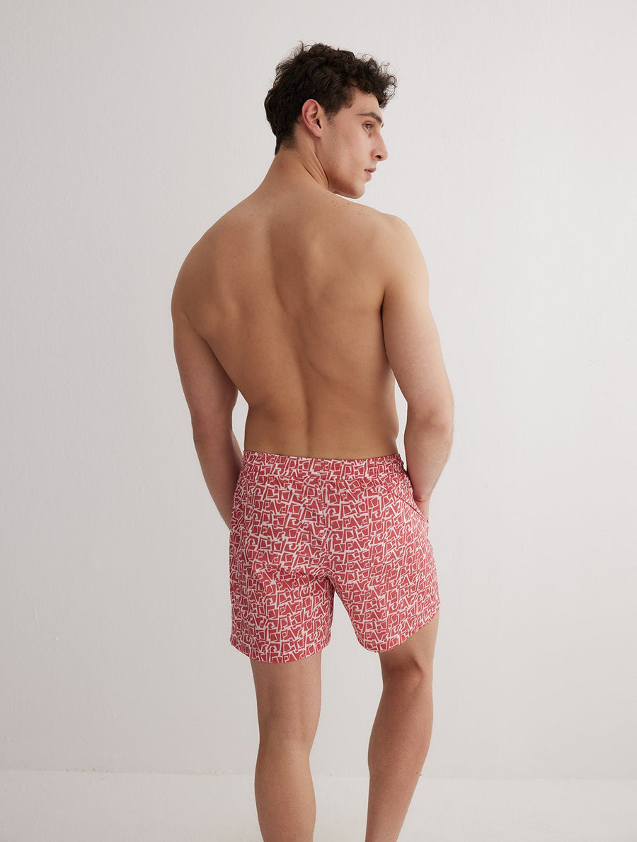 Back View: Model in Louis Red Mosaic Shorts - MOEVA Luxury Swimwear, Men Swim Shorts, Nikel, Mid Length Swim Shorts, Fully Lined, Slim Fit, Quick Dry, MOEVA Luxury Swimwear