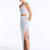 Lyndon Silver Knitted Skirt with Side Slit | Moeva | RTW Skirts | Each week unveils new pieces—luxury swimwear, fluid resort silhouettes, and elevated summer-to-evening essentials designed to carry you from coastal escapes to city nights.