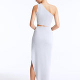 Lyndon Silver Knitted Skirt with Side Slit | Moeva | RTW Skirts | Each week unveils new pieces—luxury swimwear, fluid resort silhouettes, and elevated summer-to-evening essentials designed to carry you from coastal escapes to city nights.