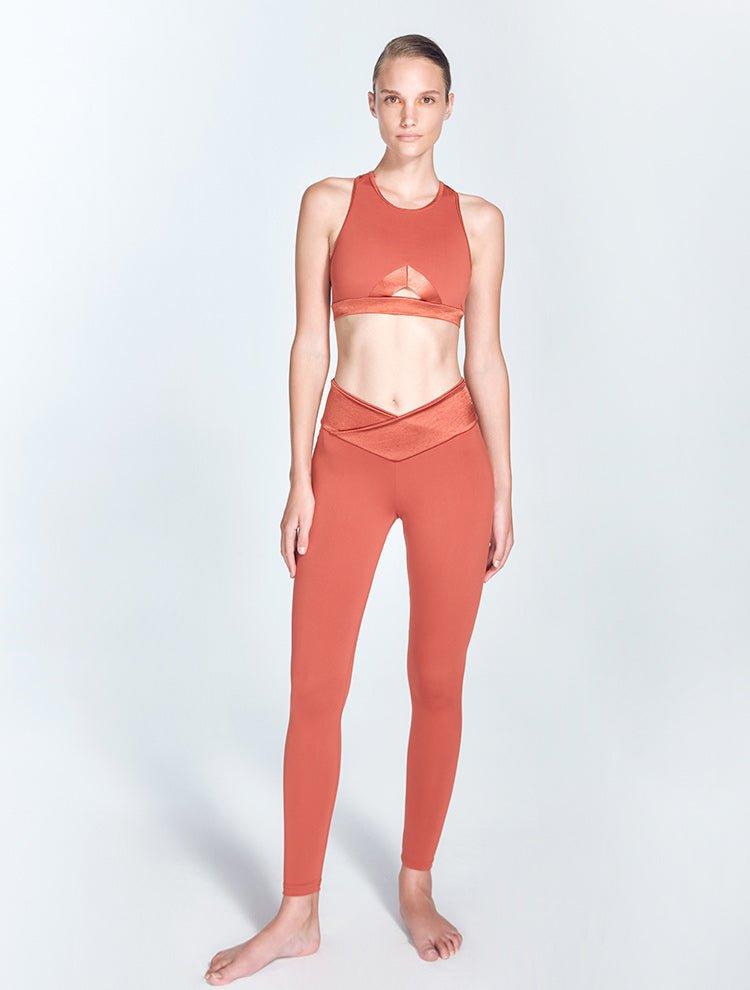 Melina Red Ochre Leggings | Moeva | Activewear | Each week unveils new pieces—luxury swimwear, fluid resort silhouettes, and elevated summer-to-evening essentials designed to carry you from coastal escapes to city nights.