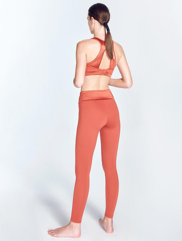 Melina Red Ochre Leggings | Moeva | Activewear | Each week unveils new pieces—luxury swimwear, fluid resort silhouettes, and elevated summer-to-evening essentials designed to carry you from coastal escapes to city nights.