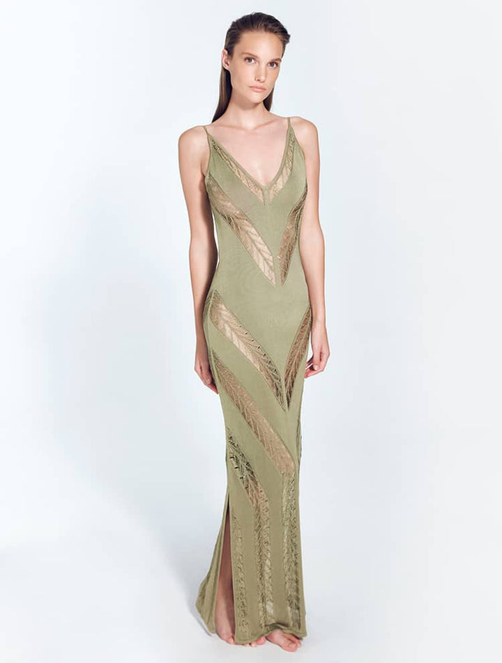 Front View: Model in Mimi Shiny Green Dress - MOEVA Luxury Swimwear, Mesh Knit, Scoop Neckline, Ankle Length, MOEVA Luxury Swimwear