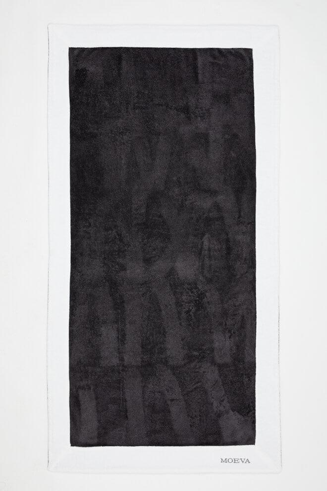 Monaco Dark Grey/White Towel | Moeva | Towel | Each week unveils new pieces—luxury swimwear, fluid resort silhouettes, and elevated summer-to-evening essentials designed to carry you from coastal escapes to city nights.