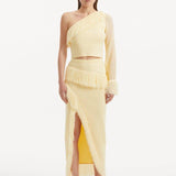 Monroe Yellow One-Shoulder Knit Top with Fringe & Mesh Sleeve | Moeva | Crop Top | Each week unveils new pieces—luxury swimwear, fluid resort silhouettes, and elevated summer-to-evening essentials designed to carry you from coastal escapes to city nights.