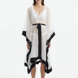 Opal White-Black Sheer Gold Buttoned Belted Kaftan | Moeva | Kaftan | Each week unveils new pieces—luxury swimwear, fluid resort silhouettes, and elevated summer-to-evening essentials designed to carry you from coastal escapes to city nights.