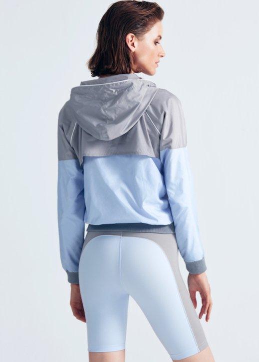 Parker Grey/Blue Jacket | Moeva | Activewear | Each week unveils new pieces—luxury swimwear, fluid resort silhouettes, and elevated summer-to-evening essentials designed to carry you from coastal escapes to city nights.