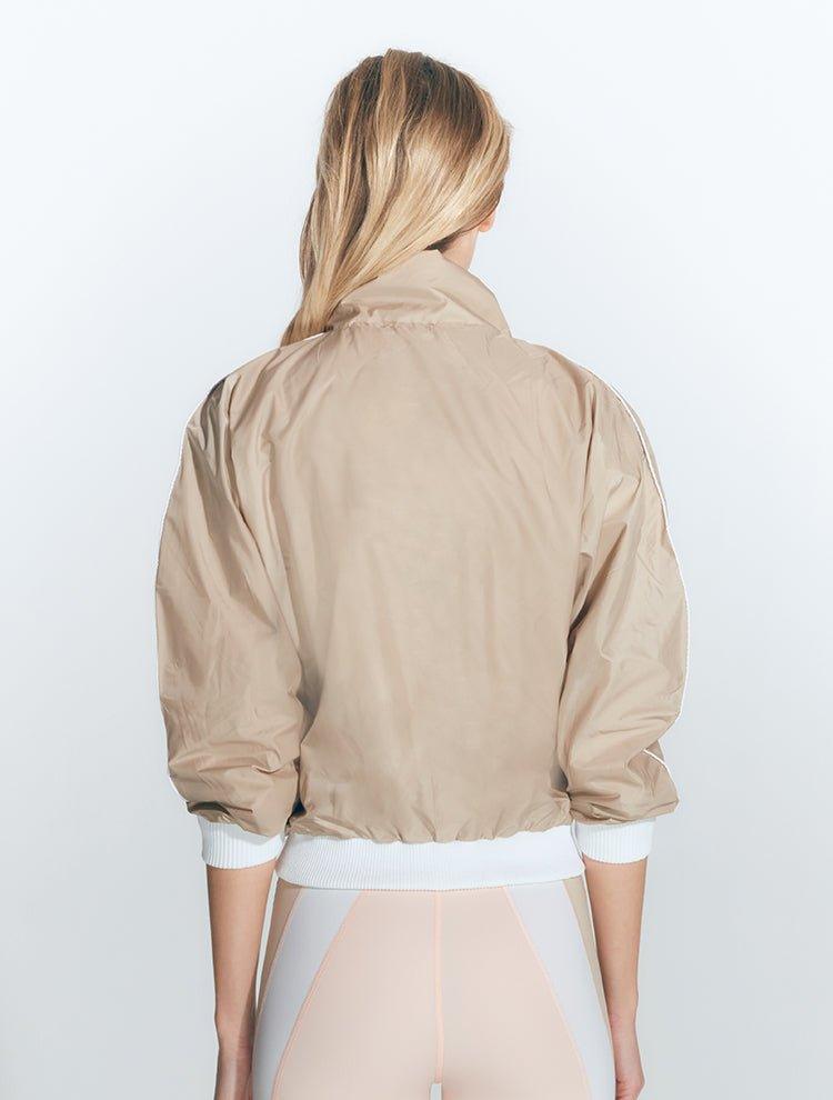 Pixie Pink/Nude/White Jacket | Moeva | Activewear | Each week unveils new pieces—luxury swimwear, fluid resort silhouettes, and elevated summer-to-evening essentials designed to carry you from coastal escapes to city nights.