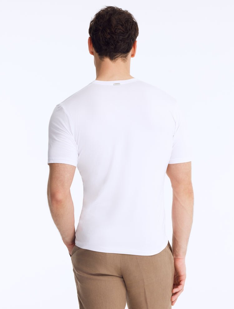 Back View: Rex White T-Shirt on Model - MOEVA Luxury Swimwear, Short-Sleeved, Slim Fit, Embroidered Moeva Amblem, MOEVA Luxury Swimwear  