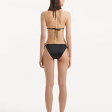 Laura Badura - Rhea Black Triangle Side Tie Satin Bikini Set | Moeva | | Each week unveils new pieces—luxury swimwear, fluid resort silhouettes, and elevated summer-to-evening essentials designed to carry you from coastal escapes to city nights.