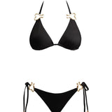 Tara De Vries - Rhea Black Triangle Side Tie Satin Bikini Set | Moeva | | Each week unveils new pieces—luxury swimwear, fluid resort silhouettes, and elevated summer-to-evening essentials designed to carry you from coastal escapes to city nights.