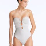 Rhodes Silver Bandeau Cut-Out Swimsuit | Moeva | Swimsuit | Each week unveils new pieces—luxury swimwear, fluid resort silhouettes, and elevated summer-to-evening essentials designed to carry you from coastal escapes to city nights.