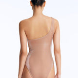 Rowan Bronze One-Shoulder Swimsuit with Hoop Detail | Moeva | Swimsuit | Each week unveils new pieces—luxury swimwear, fluid resort silhouettes, and elevated summer-to-evening essentials designed to carry you from coastal escapes to city nights.