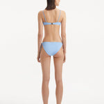 Salila Baby Blue Underwired Wave Textured Bikini Top | Moeva | Bikini Top | Each week unveils new pieces—luxury swimwear, fluid resort silhouettes, and elevated summer-to-evening essentials designed to carry you from coastal escapes to city nights.