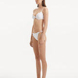 Doina - Salila White Underwired Side Tie Wave Textured Bikini Set | Moeva | | Each week unveils new pieces—luxury swimwear, fluid resort silhouettes, and elevated summer-to-evening essentials designed to carry you from coastal escapes to city nights.