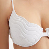 Salila White Underwired Wave Textured Bikini Top | Moeva | Bikini Top | Each week unveils new pieces—luxury swimwear, fluid resort silhouettes, and elevated summer-to-evening essentials designed to carry you from coastal escapes to city nights.