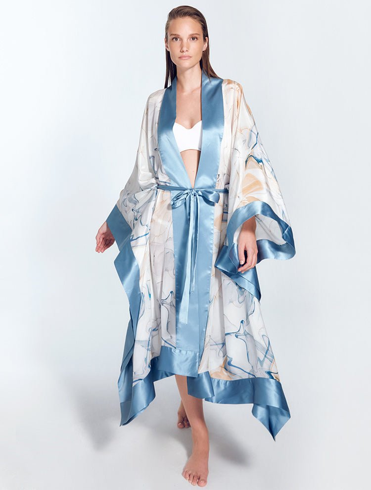 Front View: Model in Salina Blue Abstract/Nude Kaftan - MOEVA Luxury Swimwear, Long Sleeved, Ankle Length, MOEVA Luxury Swimwear
