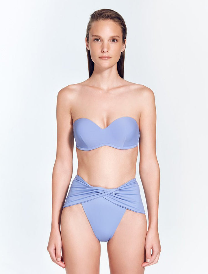 Front View: Model in Skylar Blue Bikini Bottom - MOEVA Luxury Swimwear, High Waist Bikini Bottom, High-Leg Silhouette, Moderate Coverage Bottom, MOEVA Luxury Swimwear