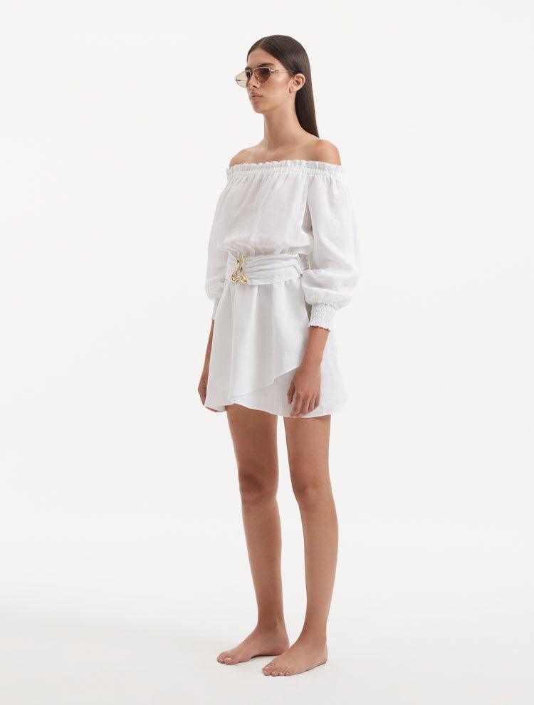 Sumner White Off-Shoulder Linen Mini Dress | Moeva | Dress | Each week unveils new pieces—luxury swimwear, fluid resort silhouettes, and elevated summer-to-evening essentials designed to carry you from coastal escapes to city nights.