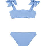 Tia Baby Blue Kids Bikini Set with Bow Strap Detail | Moeva | Kids Bikinis | Each week unveils new pieces—luxury swimwear, fluid resort silhouettes, and elevated summer-to-evening essentials designed to carry you from coastal escapes to city nights.