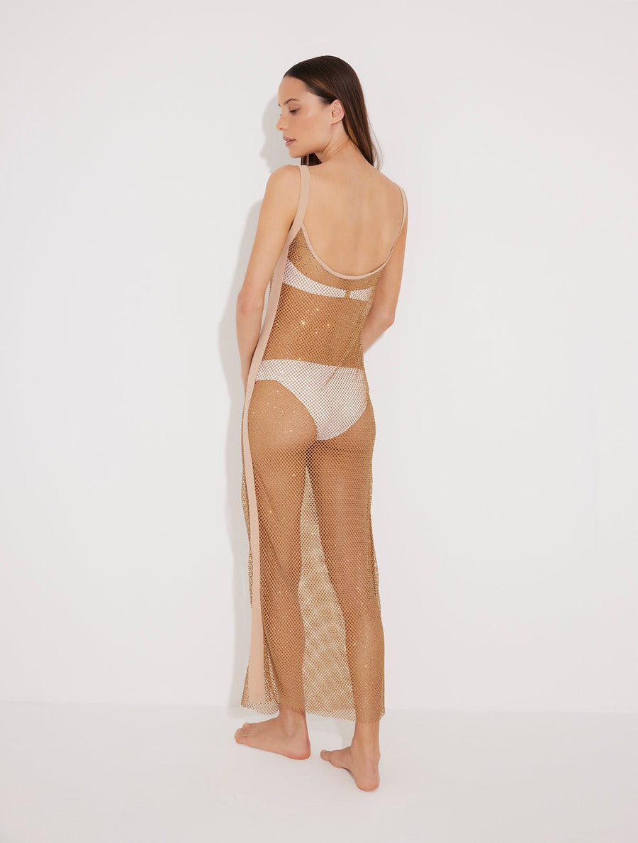 Back View: Model in Triana Nude Dress - MOEVA Luxury Swimwear, Scoop Neck Maxi Dress, Unlined, Chic, Rhinestone Fabric, MOEVA Luxury Swimwear