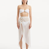 Xander White Sheer Maxi Skirt with Gold Button Details | Moeva | Beachwear Skirts | Each week unveils new pieces—luxury swimwear, fluid resort silhouettes, and elevated summer-to-evening essentials designed to carry you from coastal escapes to city nights.