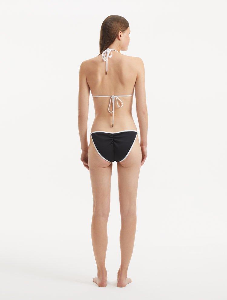 Zarya Black Triangle Textured Mid Coverage Bikini Set | Moeva | | Each week unveils new pieces—luxury swimwear, fluid resort silhouettes, and elevated summer-to-evening essentials designed to carry you from coastal escapes to city nights.