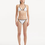 Zarya White Mid Coverage Bikini Bottom | Moeva | Bikini Bottom | Each week unveils new pieces—luxury swimwear, fluid resort silhouettes, and elevated summer-to-evening essentials designed to carry you from coastal escapes to city nights.