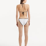 Zarya White Triangle Textured Bikini Top | Moeva | Bikini Top | Each week unveils new pieces—luxury swimwear, fluid resort silhouettes, and elevated summer-to-evening essentials designed to carry you from coastal escapes to city nights.